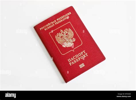 Russian foreign passport on a light gray background. Dark red passport cover Stock Photo - Alamy