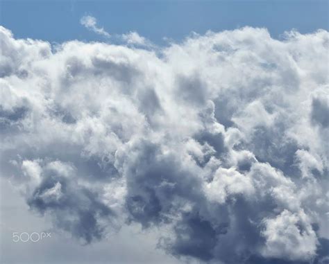 Twisted Clouds - Close up of clouds twisting up into the sky on a warm ...