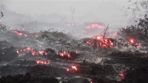 Indonesia arrests around 200 as thick smog from forest fires reaches hazardous levels - CNN