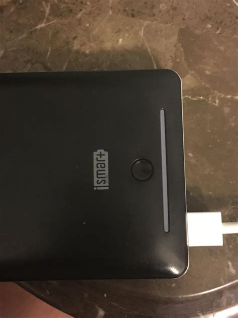 The logo on my portable charger can be read both ways : r/mildlyinteresting