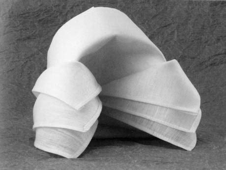 The History and Techniques of Napkin Folding