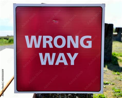 Wrong way pedestrian sign Stock Photo | Adobe Stock