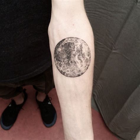 Full moon tattoo on the left forearm - Tattoogrid.net