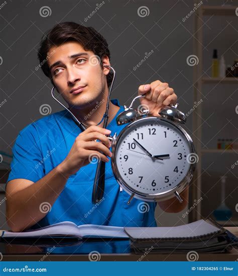 Young Handsome Doctor Working Night Shift in Hospital Stock Image - Image of overtime, medic ...