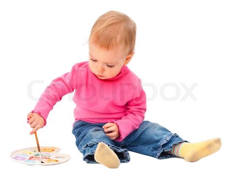 One year baby try to draw. isolated on ... | Stock image | Colourbox