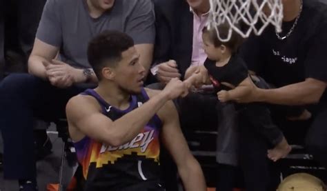 NBA Memes on Twitter: "Devin Booker fist bumping a toddler is gotta be the photo of the day 😂 ...