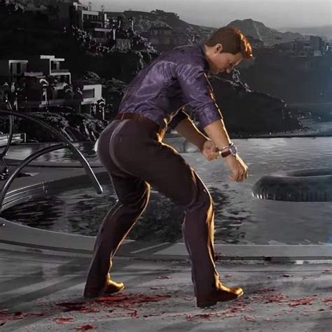 a man in purple shirt and black pants holding a knife with blood on the ground