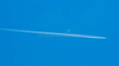 Airplane vapor trails stock image. Image of vapor, over - 27394751