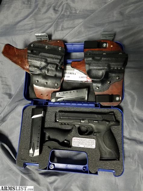 ARMSLIST - For Sale: Smith & Wesson M&P40 w/ 2 holsters and extended mag