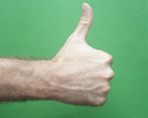 Free Image of Man Hand Showing Thumbs Up Sign | Freebie.Photography