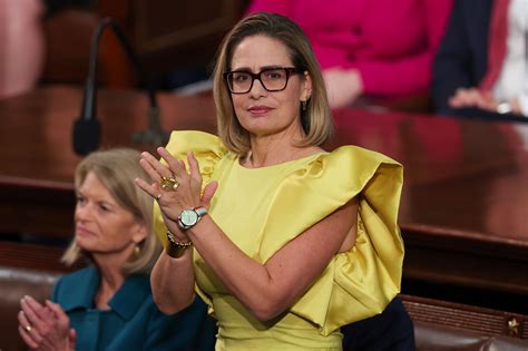 Sen. Kyrsten Sinema’s yellow dress at State of the Union draws mockery ...