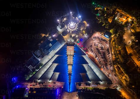 Aerial view of our Lady of Lebanon Basilica and statue illuminated at ...