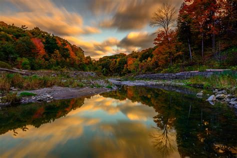 Serene Forest River in Fall - HD Wallpaper