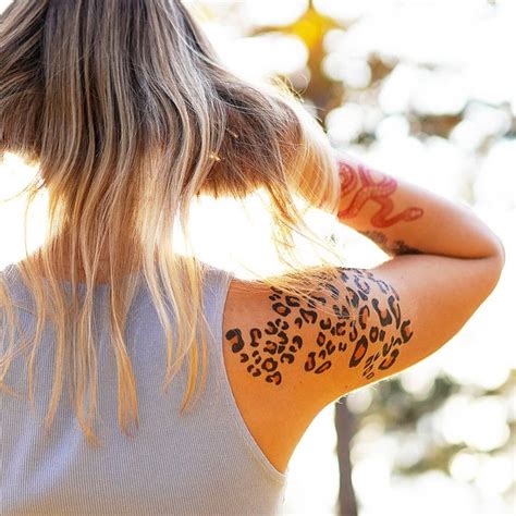 Cheetah Print Tattoos With Flowers