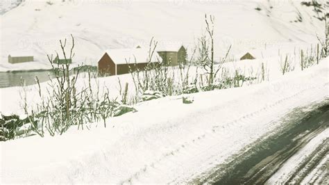 Stunning winter scenery with traditional Norwegian wooden houses 5590730 Stock Photo at Vecteezy