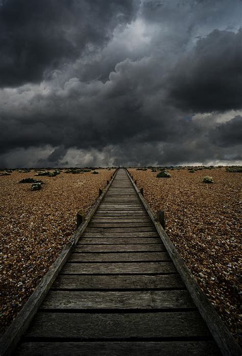 Wooden Path In The Wilderness. Dramatic Sky In The Background Photograph by Jaroslaw Blaminsky