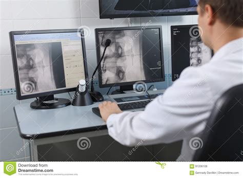 Doctor Looking at the Computer Monitor Stock Photo - Image of looking ...