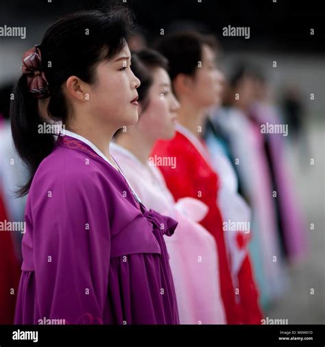 North Korean women paying respect to Kim il Sung in Mansudae Grand monument, Pyongan Province ...