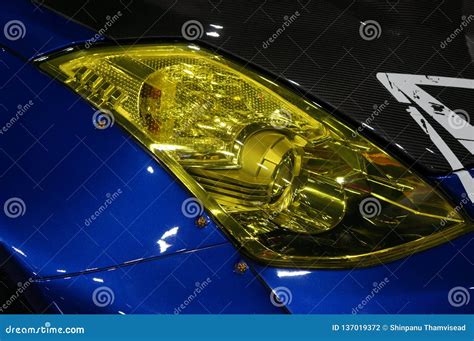 Detail on One of the Yellow Headlights Modern Car Stock Photo - Image of modern, lamp: 137019372