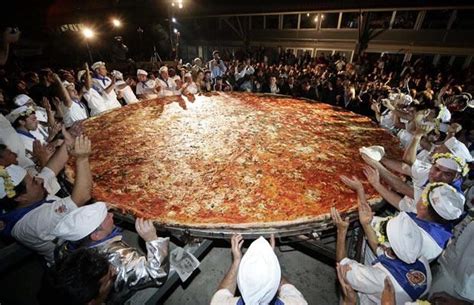 The world's biggest pizza in Italy measuring 5m and 19cm in diameter ...