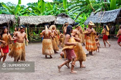 Iquitos, Peru, Amazon Jungle, A Yagua Tribe does a cermonial dance in their village square ...