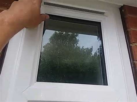 Cleaning windows with trickle vents by NKServices - YouTube