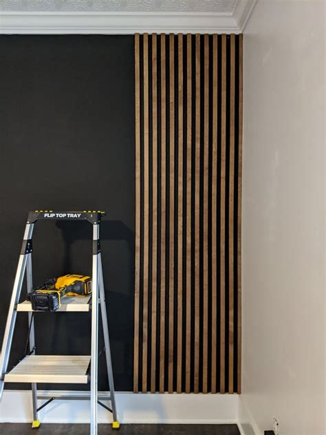 HOW TO MAKE AN AFFORDABLE WOOD SLAT WALL in 2021 | Wood slat wall, Modern wall paneling, Slat wall