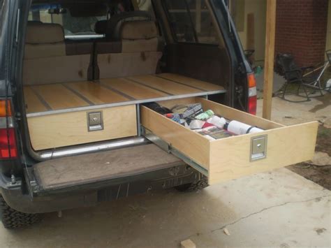 not just for trucks - great idea for my hatchback! drawer/storage ...