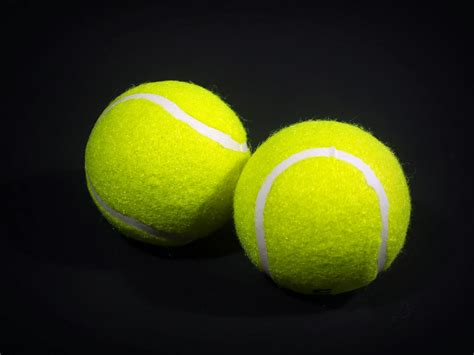 Two Green Lawn Tennis Balls · Free Stock Photo