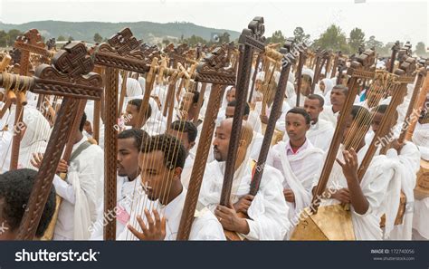 Addis Ababa - Jan 19: Clergy Play Begena, A Traditional String Instrument, While Accompanying ...