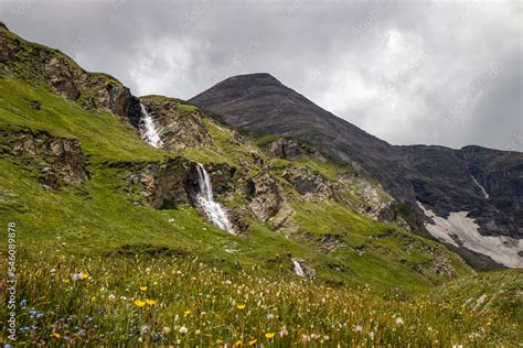 The beautiful panoramic view of Nassfeld Speicher lake waterfall. High Tauern National Park ...