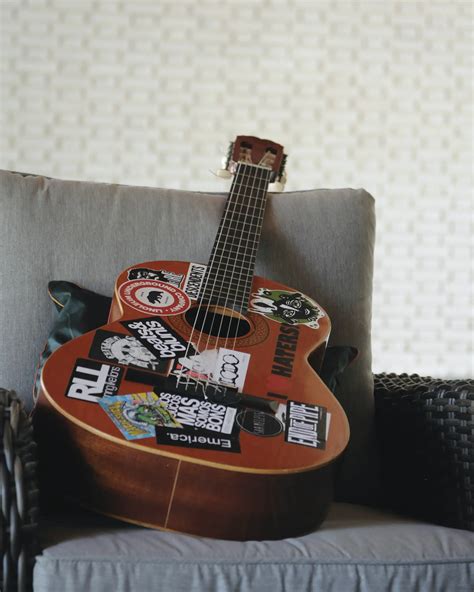 Stickers On Guitar: Safe Place To Put & The Impact On Sound | Strumming Bars