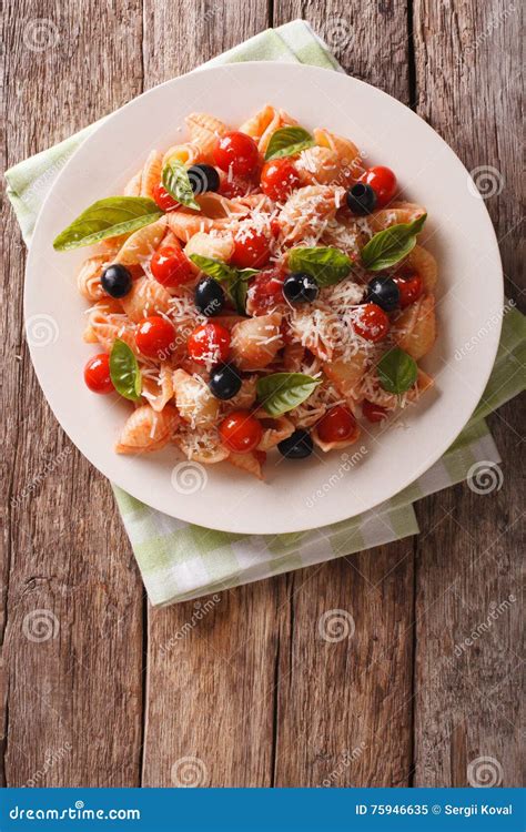 Conchiglie with Tomato Sauce, Olives and Parmesan Cheese Close-u Stock Image - Image of healthy ...