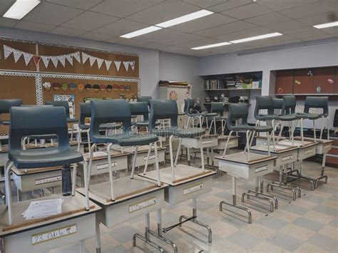 Empty Classroom with Chairs Put on Top of Desks Stock Photo - Image of empty, table: 234492760