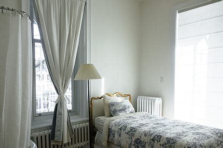 Royalty-Free photo: White satin bed | PickPik