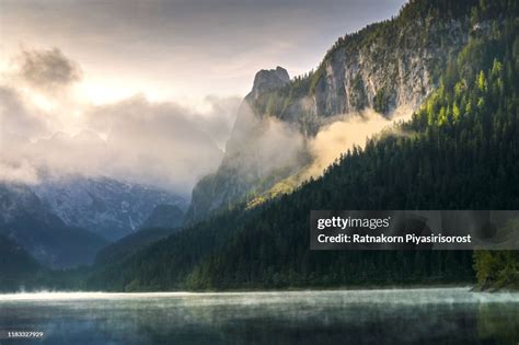 Fantastic Sunrise Scene With Fog Over Lake At Azure Alpine Lake ...