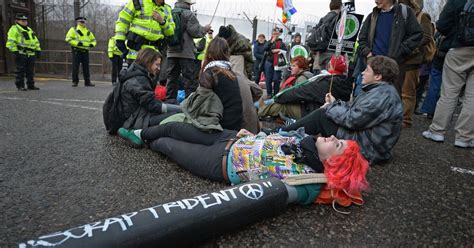 In pictures: Protesters clash with police at Faslane during anti ...