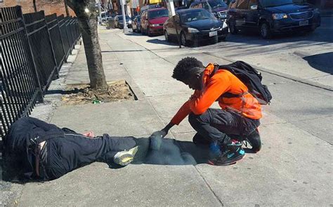 Viral Photo: Boy praying over a sleeping homeless guy in Baltimore ...