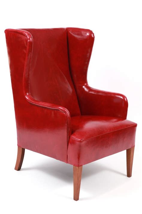 Illums Bolighus Leather Wingback Chair and Ottoman | red modern furniture