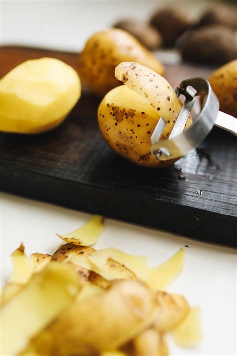 Photo Of Peeling Of Potatoes · Free Stock Photo