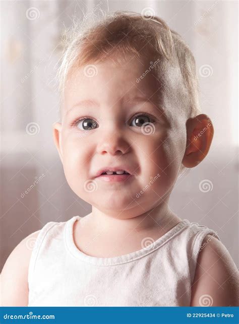 Frightened baby face stock photo. Image of emotion, confused - 22925434