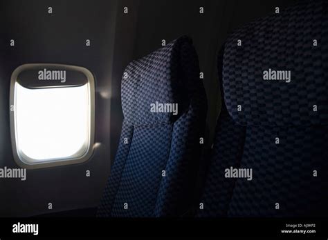 Window seat on airplane Stock Photo - Alamy