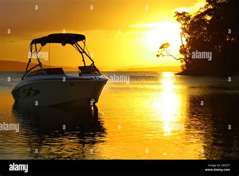 Lake, Boat, Sunset Stock Photo - Alamy