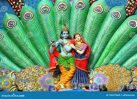 Sculpture of Radha Krishna and Peacock Feather during Dahi Handi ...