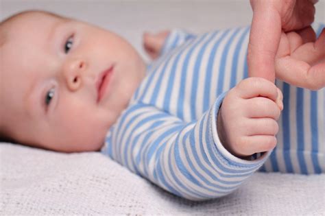 Why Do Babies Close Their Fists So Tightly Around Your Fingers ...