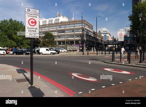 Congestion charge zone road markings and signs in London Stock Photo - Alamy