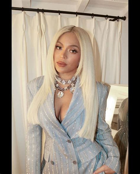 Beyoncé Put a Holiday Twist on the Classic Pinstripe Suit