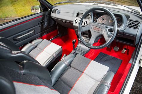 Peugeot 205 GTI Buyer's Guide & History - Garage Dreams