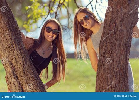 Young Girls Laughing and Having Fun in Park Stock Photo - Image of trendy, people: 60519060