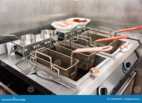 Industrial Deep Fat Frying Unit Stock Photo - Image of bacon, pots: 146244440